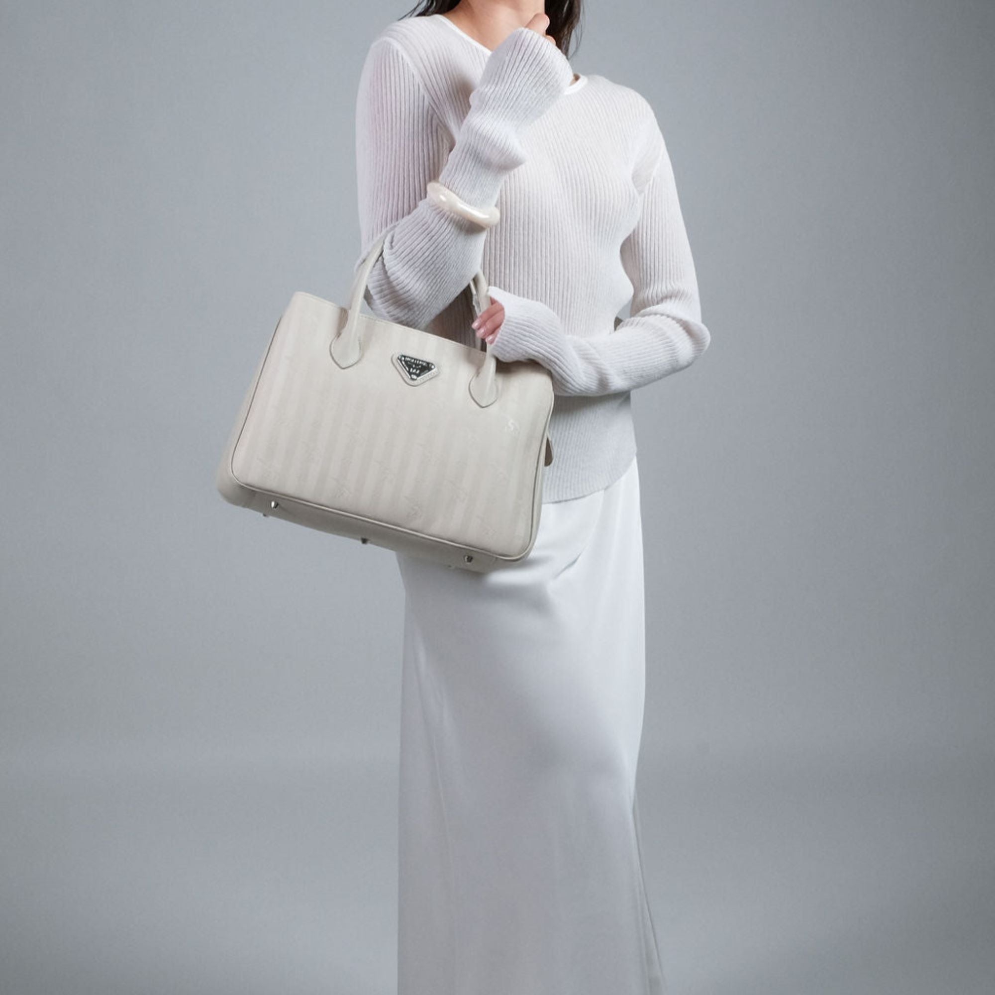 DONAT | Handtasche pearl/silber on body