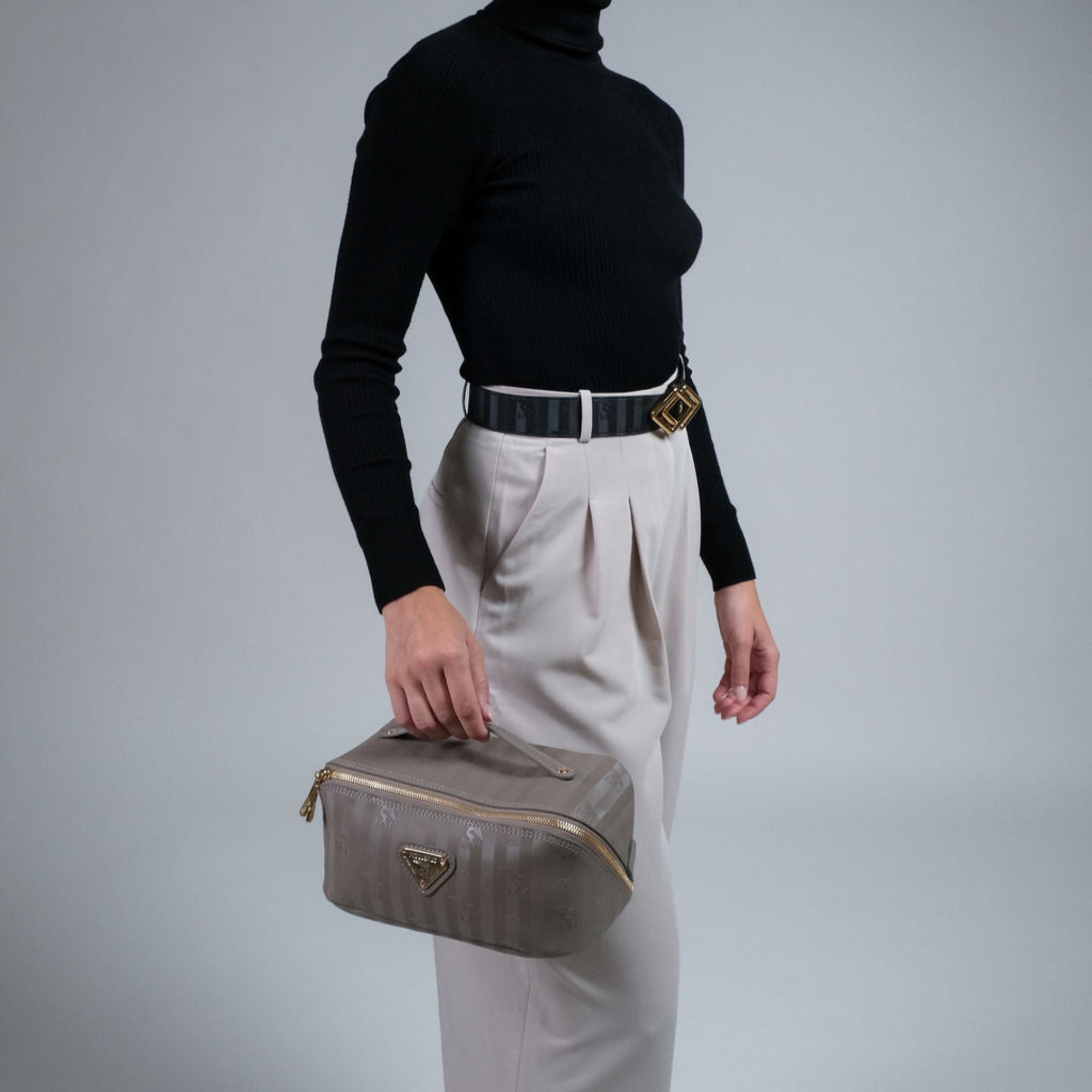 SERVAZ | Trousse de toilette taupe/doré