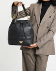 NIESEN | Pouch bag calfskin black/gold