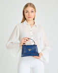 ROMONT | Umhängetasche Croco sapphire blau/gold - on body