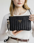 TAMINS | Umhängetasche classic schwarz/gold - detail
