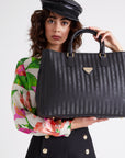 UMIKEN | black/gold - Maison Mollerus - CLOSE UP on body