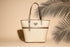 Tasche Miami in Rafia beige von Maiosn Mollerus mit braunem Besatzmaterial in Leder