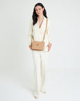 MELIDE | Umhängetasche cappuccino beige/gold - full body