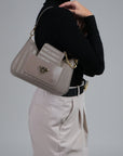 CASTIEL | Sac bandoulière taupe/doré