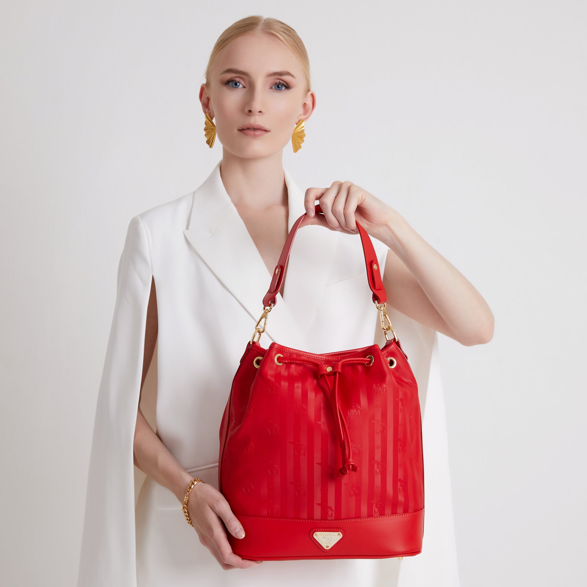 NIESEN | Beuteltasche cherry rot/gold close up