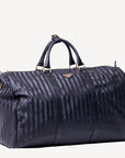 FLUELA | Reisetasche classic schwarz/gold - seitlich